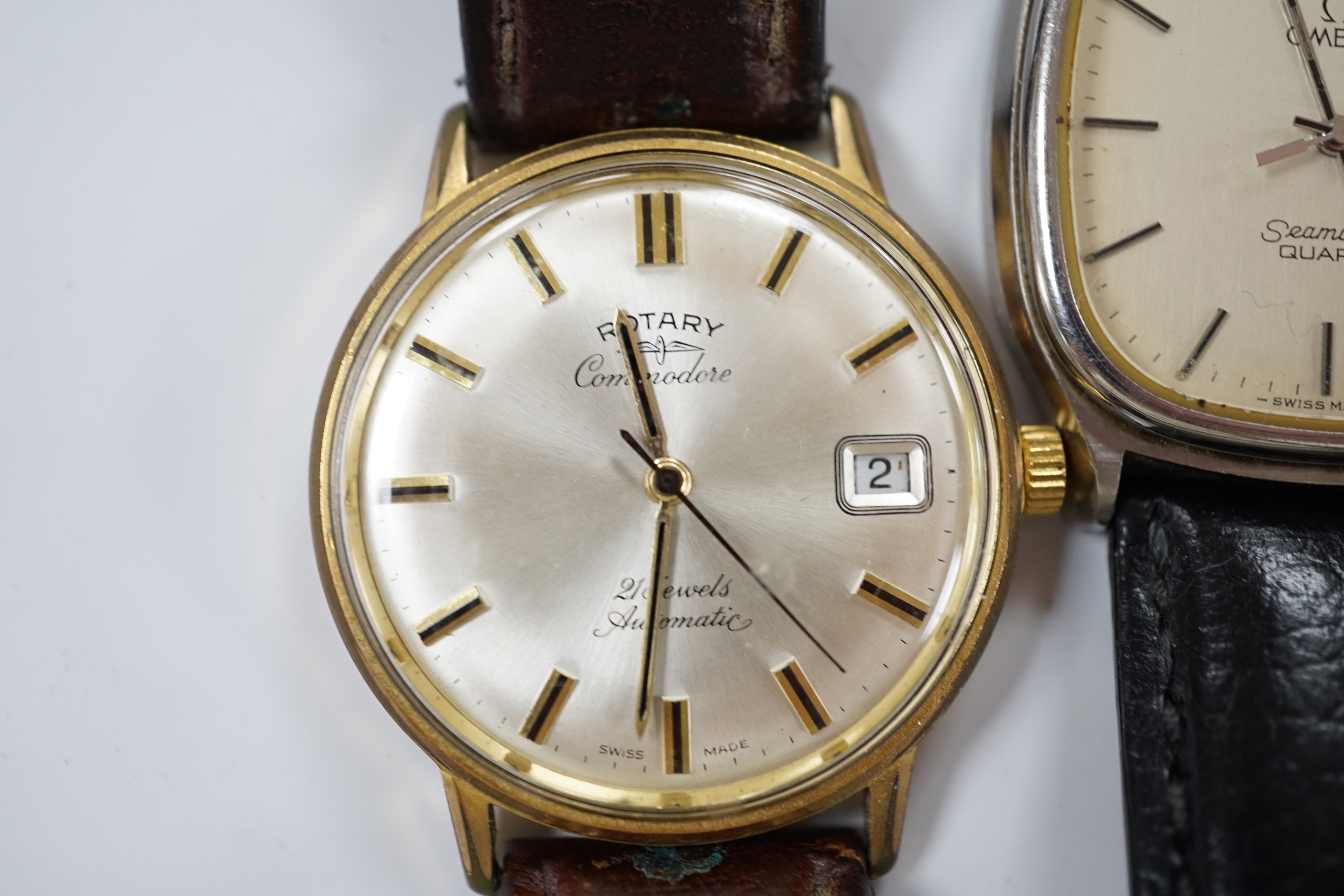 A gentleman's stainless steel Omega Seamaster quartz wrist watch, on associated leather strap, together with a gentleman's steel and gold plated Rotary Commodore automatic wrist watch and a French? wrist watch.
